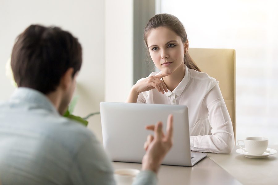 Female manager interacting with employee